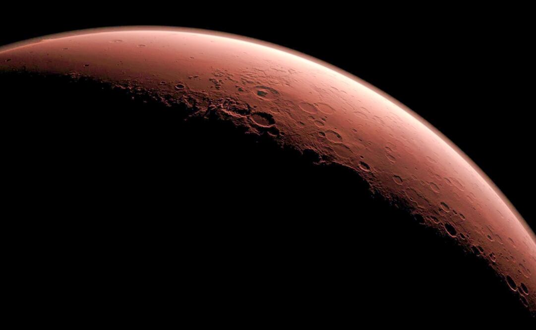 This computer-generated image depicts part of Mars at the boundary between darkness and daylight – Photo: NASA/REUTERS