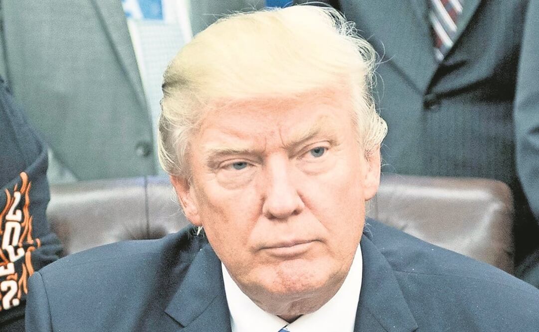 Donald Trump asegura que su gabinete trabaja en un proyecto de reforma fiscal que reducirá el déficit comercial. (RON SACHS. EFE)