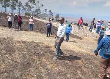 Realizan bloqueo intermitente en la autopista México-Querétaro por disputa de predio