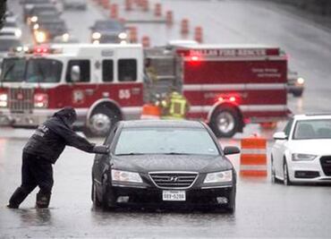 Texas swamped by heavy rain, triggering flash floods