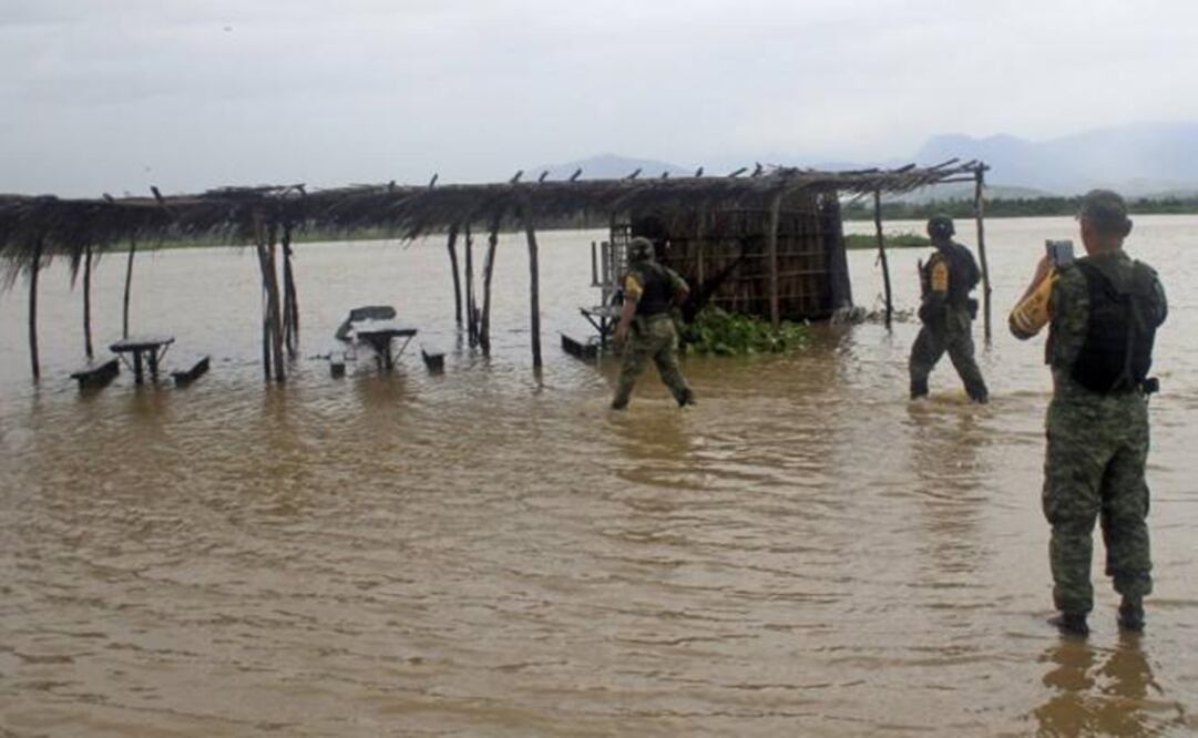Blocked roads, floods and fallen trees are the results of the tropical storm. (Photo: Reuters)