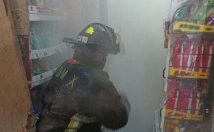 Corto circuito provoca incendio en un local de la Central de Abasto