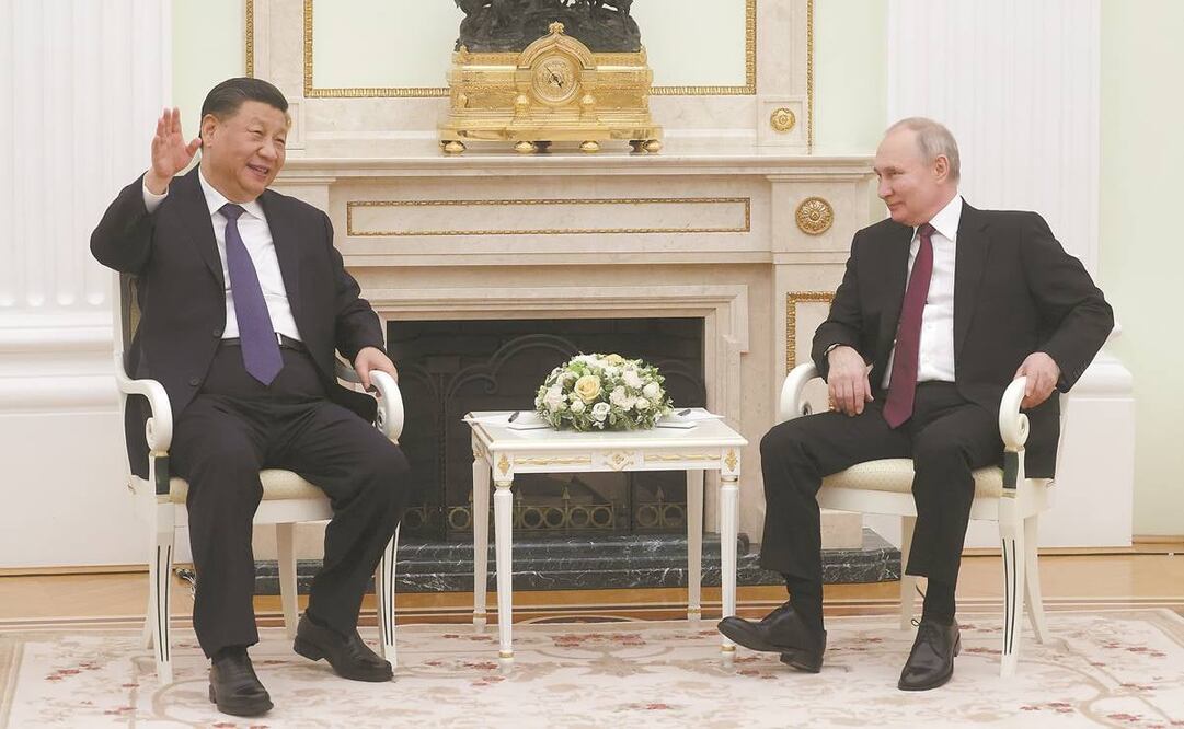 Xi Jinping y Vladimir Putin durante su reunión en el Kremlin, en Mos- cú, en el marco de la visita de tres días del mandatario chino a Rusia.