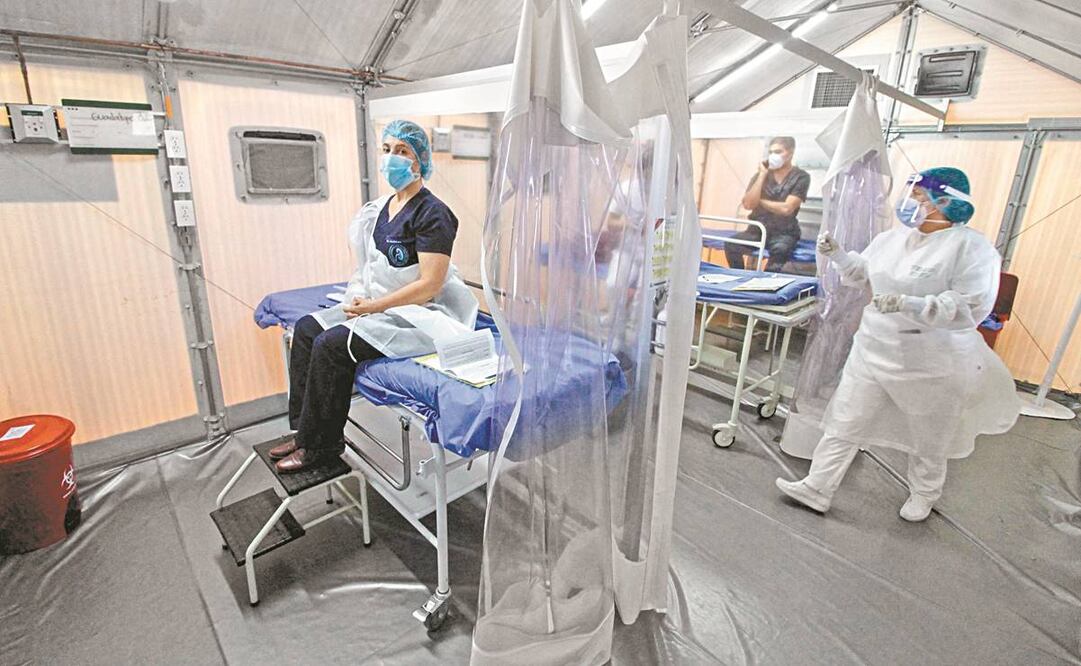 Empleados de la salud esperan su turno para ser vacunados contra el coronavirus con la dosis de Pfizer/BioNTech en Cucuta, Colombia. Foto: Schneyder Mendoza. AFP