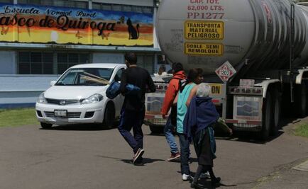 Reportan gresca entre normalistas y policías en Michoacán