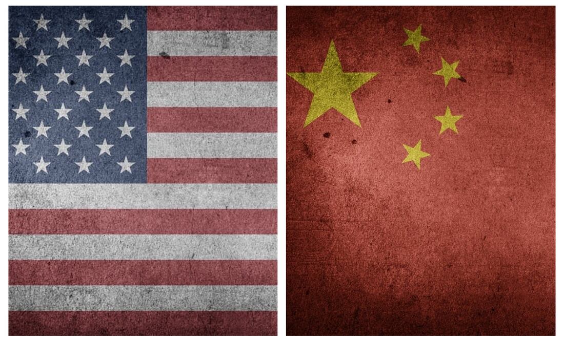 Banderas de Estados Unidos (EU) y China. Foto: Especial