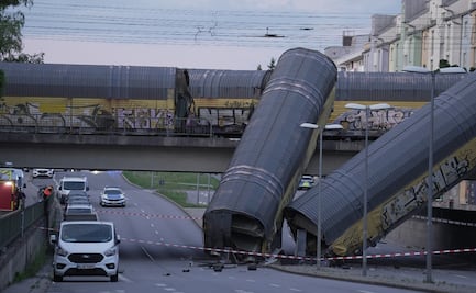 Choque de trenes, ahora en Alemania, deja un muerto; dos vagones cayeron desde un puente