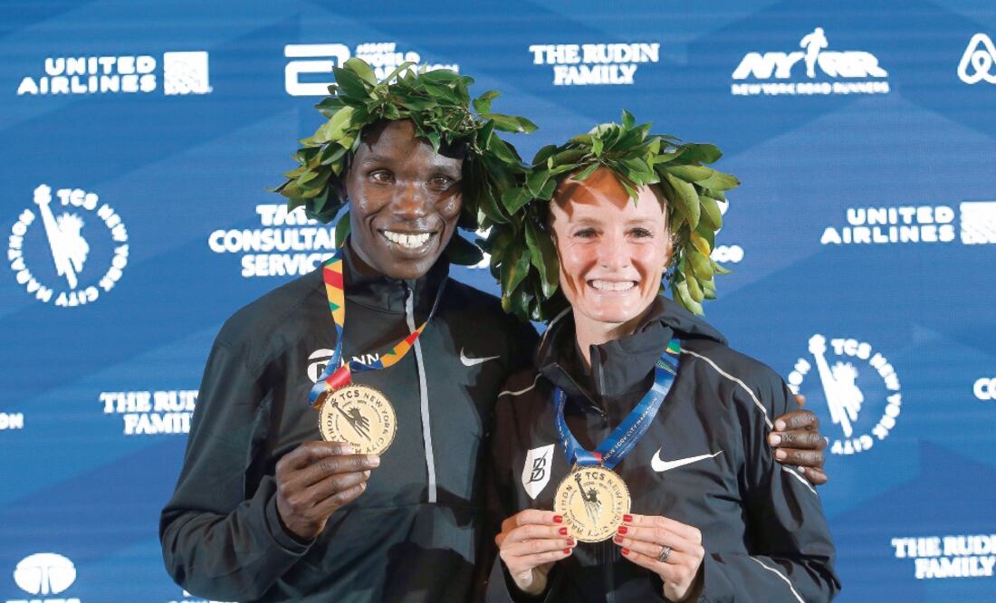 Kamworor nunca había ganado en los 42 kilómetros, y Flanagan es la primera estadounidense, en 40 años, que se lleva la prueba. (JASON DECROW. AP)