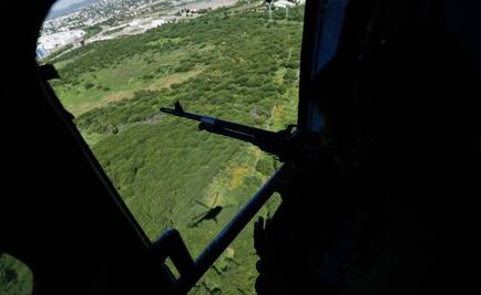 Hallan armas en vehículos abandonados en Sinaloa