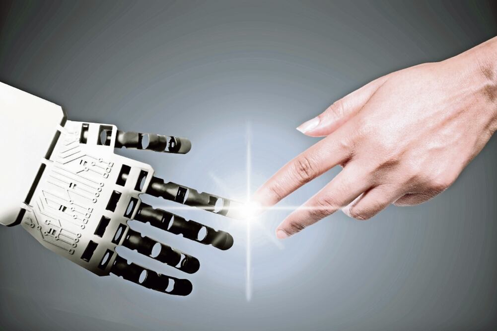 Humanos y máquinas van a coexistir en el trabajo. (ISTOCKPHOTO.COM)