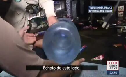 ¿Robo o ayuda? Elementos de la Fiscalía de Tabasco apoyan a pobladores a sacar productos de tienda