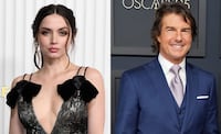 Ana de Armas dice estar lista para tener un bebé, pero Tom Cruise no la reconoce como novia. Foto: Photo by VALERIE MACON / AFP / Photo by Jordan Strauss/Invision/AP.