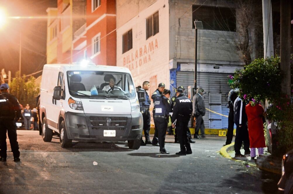 Los cuerpos quedaron frente a un billar ubicado en la esquina de las calles División del Norte y Puerto Mazatlán, en la colonia Loma la Palma (LUIS CARBAYO. CUARTOSCURO)