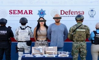 Detienen a “El Dóber”, objetivo prioritario, y una mujer en Quintana Roo; aseguran más de 213 mil pesos y 5 mil dólares