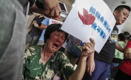 Enfado e incredulidad entre familias de pasajeros del MH370