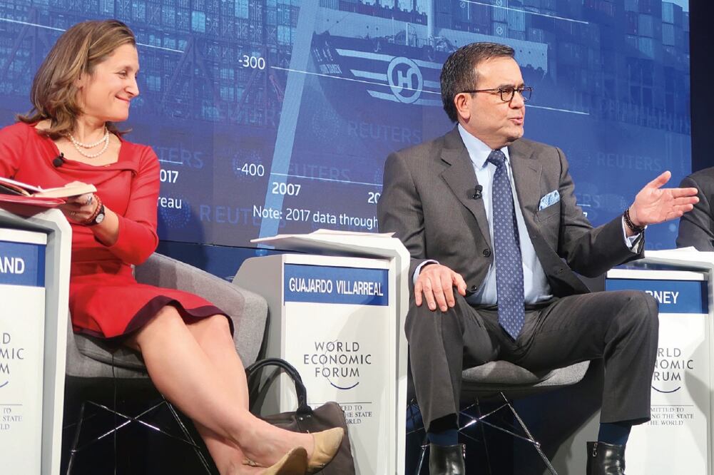 Chrystia Freeland, ministra de Relaciones Exteriores de Canadá, e Ildefonso Guajardo, secretario de Economía de México, en el foro de Davos (DAVID DEL RÍO. NOTIMEX)