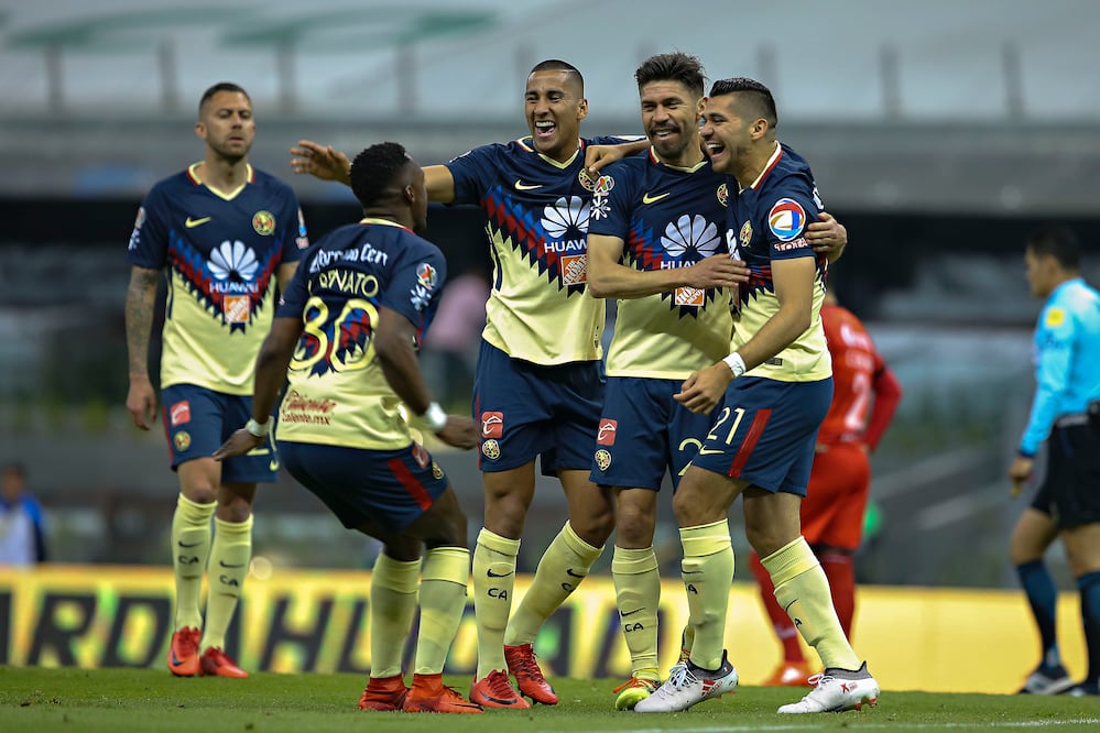 Imago7. Cecilio Domínguez, Oribe Peralta y Henry Martin celebrando el triunfo de la Jornada 5 de la Liga MX