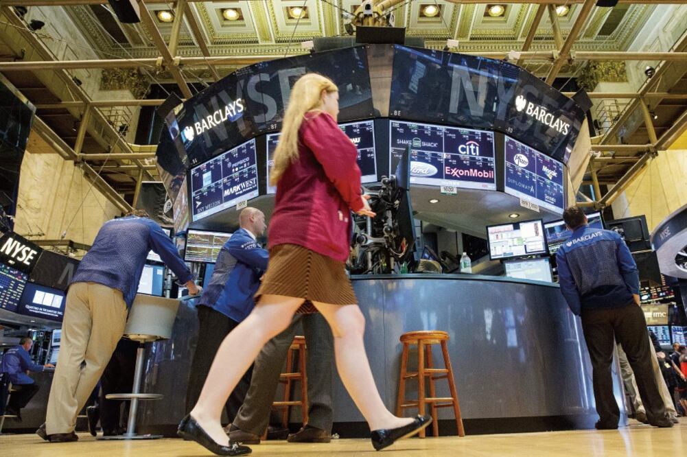 Los mercados de Nueva York concluyeron con ganancias tras la divulgación de reportes financieros correspondientes al segundo trimestre de este año. (BRENDAN MCDERMID. REUTERS)