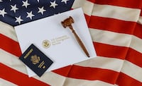 USCIS/ iStock/Cavan Images