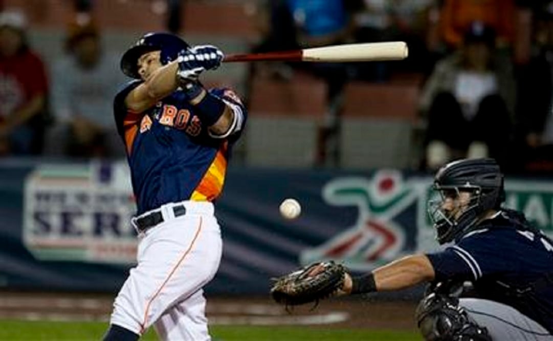 Houston Astros' Jose Altuve bats against the San Diego Padres in a spring training baseball game in Mexico City. (Photo: AP) 
