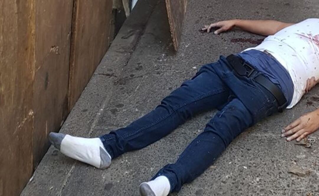 Comerciantes reportaron el hallazgo del cuerpo de un hombre en la colonia Morelos. Foto: Especial