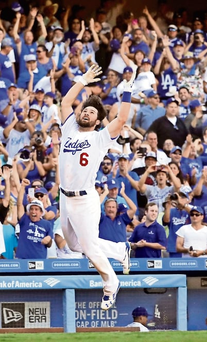 Charlie Culberson definió el juego y el banderín en el décimo rollo (CHRIS CARLSON. AP)