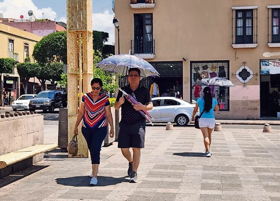 Sombrillas, bermudas y helados ante el calor
