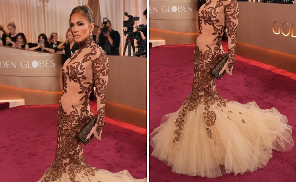 La silueta prometía, pero la transición hacia la cola rompe el equilibrio. Un vestido que no logra el impacto que JLo suele imponer. Foto: AFP