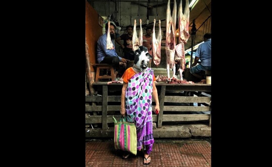 Indian photographer Sujatro Ghosh captured women wearing cow masks in different locations throughout India.