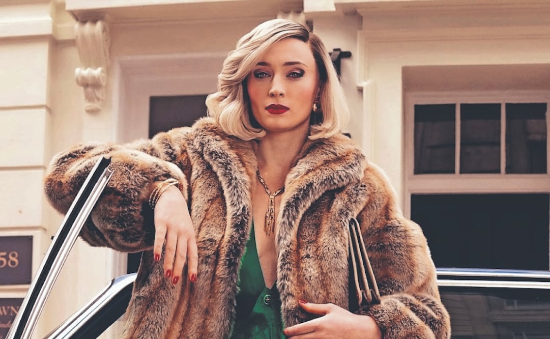 Para sus atracos, un labial rojo y un bolso elegante eran imprescindibles. Foto: de UNIVERSAL