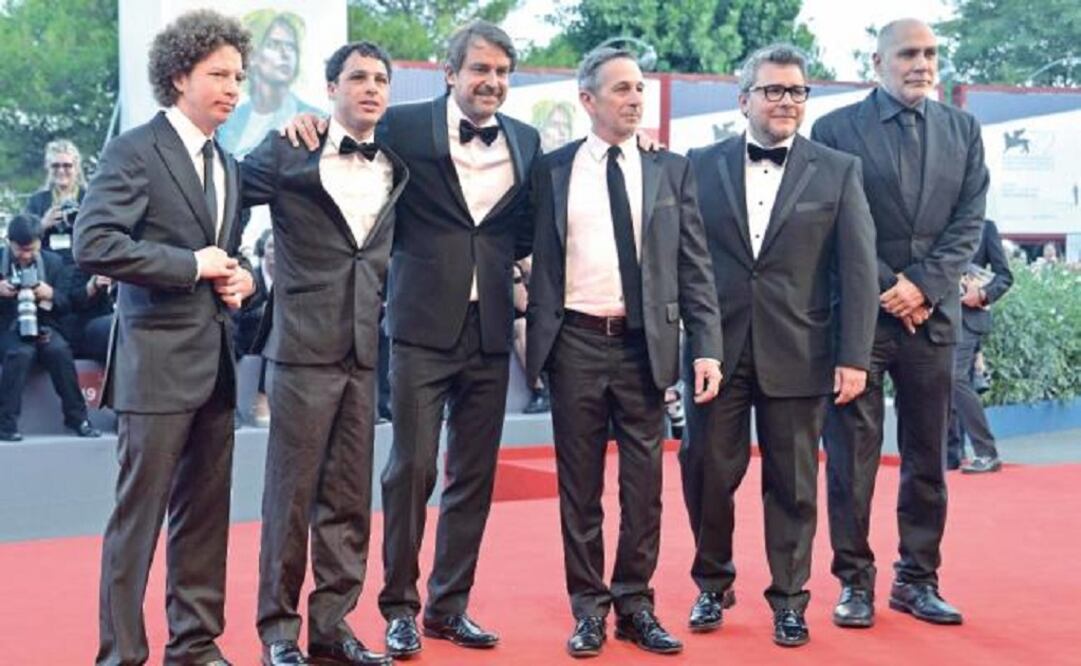 The team of "From Afar" upon their arrival to the red carpet. (Photo: AP/Invision) 