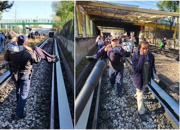 Metro CDMX: Captan a policía cargando a adulto mayor tras choque de trenes en Línea 3