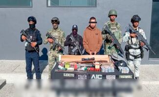 Cae sujeto con armamento y un millón de pesos en efectivo; se aseguró un inmueble