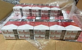 Van 88 ton de cigarrillos apócrifos asegurados en el AICM