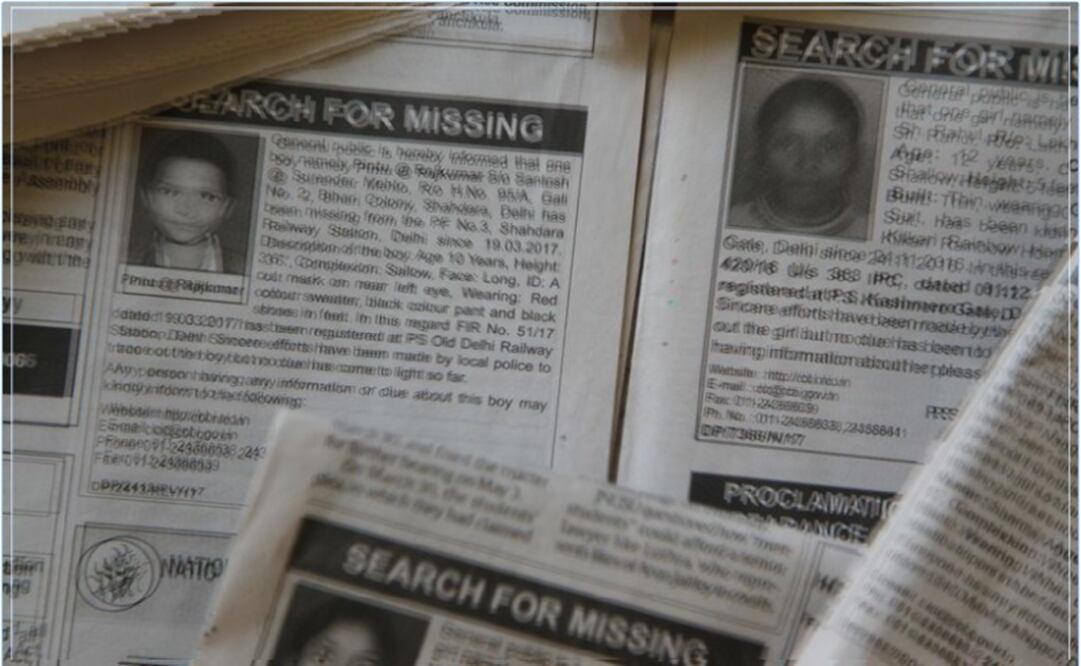 Missing children notices featured in newspapers – Photo: Nita Bhalla/REUTERS