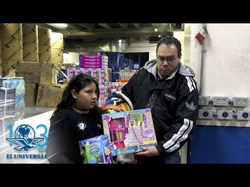 Reyes Magos dan regalos a hijos de voceadores de EL UNIVERSAL