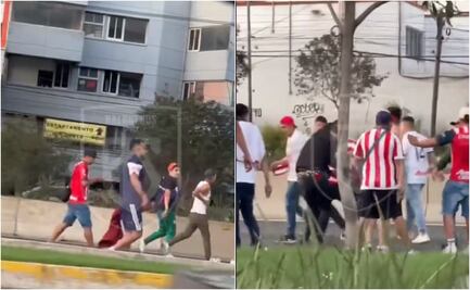 VIDEO: Aficionados de las Chivas arman pelea campal en Periférico Sur; se enfrentan a puño limpio y con palos