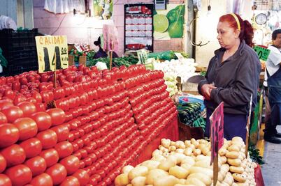 México y EU negocian por azúcar y jitomate