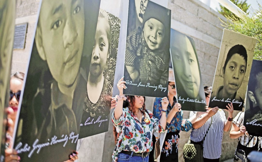 Activists hold photos of migrant children that died in U.S. custody as they protest at the Paso del Norte international border bridge -  Photo: Jose Luis Gonzalez Gonzalez/REUTERS