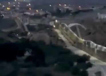 Captan en video a migrante cruzar el muro fronterizo de Melilla y Marruecos en un paracaídas