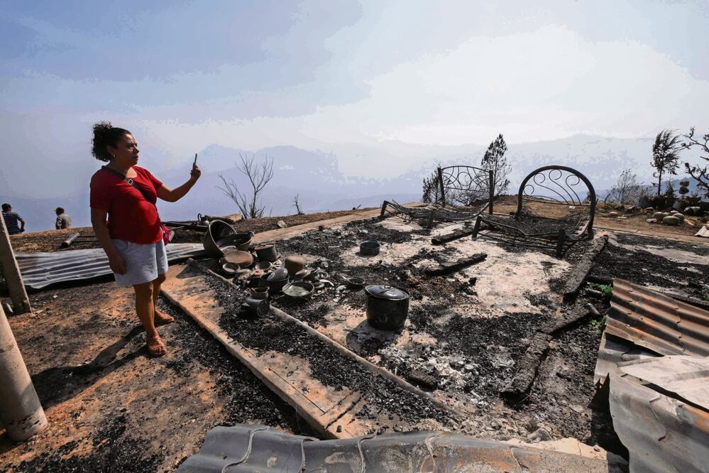 En Veracruz, habitantes de distintas comunidades se vieron obligados a dejar sus hogares a causa de los incendios. Foto: AFP