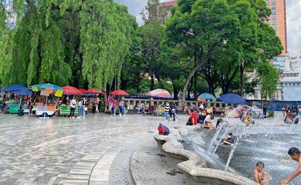 Pese a las vallas, regresan los ambulantes a la Alameda Central