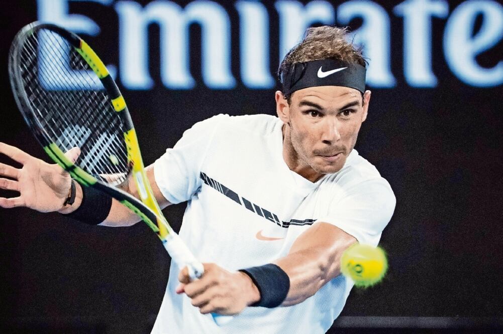 El español venció al galo, sexto del ranking, 6-3, 6-3, 4-6, 6-4. (ZHU HONGYE. XINHUA)