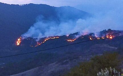 Incendio y disparos asedian a comunidad triqui en refugio de desplazados en Oaxaca 