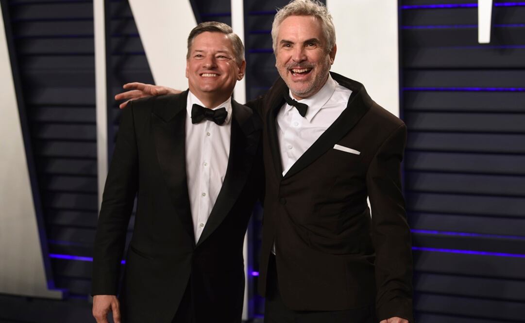 Ted Sarandos y Alfonso Cuaron. FOTO: AP