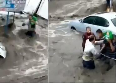 Arrastrado por la corriente, vecinos salvan a bebé en calles de Ecatepec