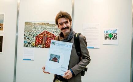 UNICEF elige como foto del año a niña en basurero iraní