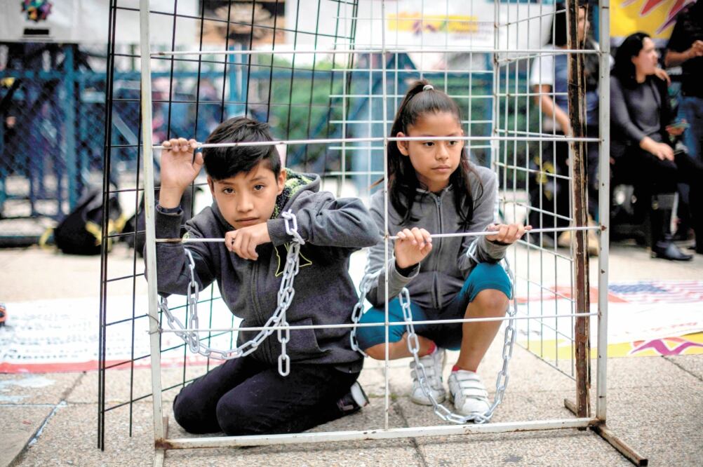 Protesta contra las políticas migratoria del gobierno de Donald Trump, el 21 de junio de 2018 en la Ciudad de México. Foto: PEDRO PARDO. AFP
