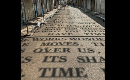 Artista pinta poesía con luz en las calles de la India