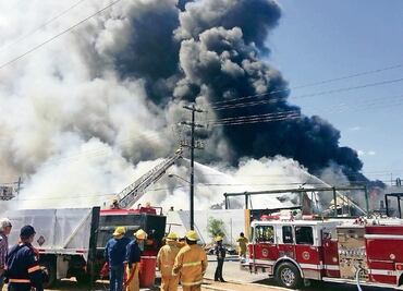 Controlan incendio en parque industrial